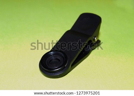 Clip-on phone camera lens