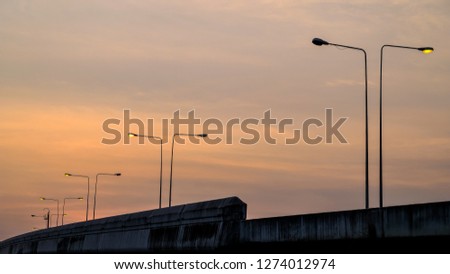 car free highway in twilight time and road light open, Evening road.