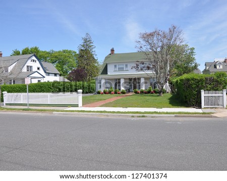 Suburban Colonial Home White Picket Fence