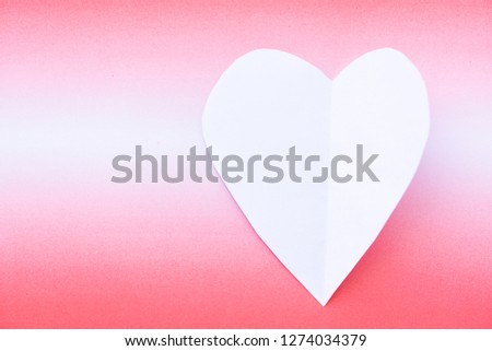 White paper heart on red background.Lover and Valentines day concept.