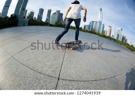 skateboarder skateboarding at sunrise city 