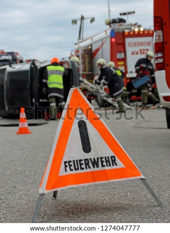 Road blocked by german fire department. Warning sign with the German word "Feuerwehr" (in English "Fire Department")