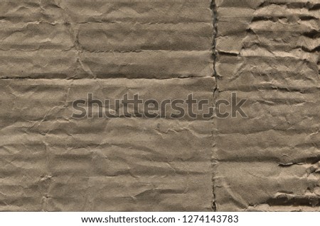 Worn and Torn Cardboard Texture