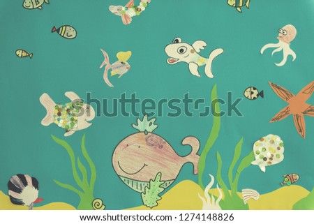 kids colorful drawing of different creatures of the sea