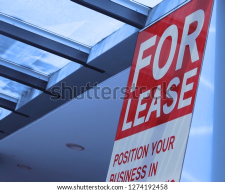 Red commercial business for lease signage out side premises