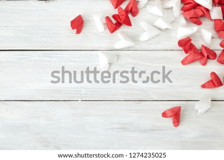 Gift Heart shape, white and red folded paper on a white wooden table with empty space for text, Valentine Day and Mother's Day concept