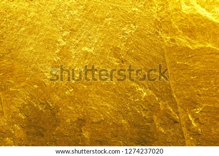 Gold stone texture for background.
