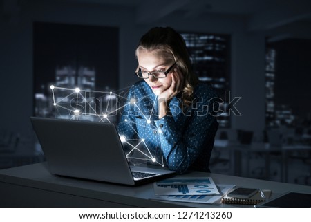 Smiling beautiful girl looking in glowing laptop screen. 3d rendering