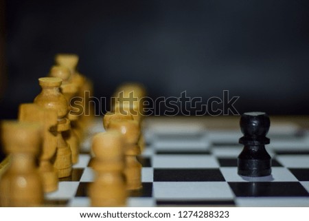 Chess game for ideas and competition and strategy. Photographed on a chessboard