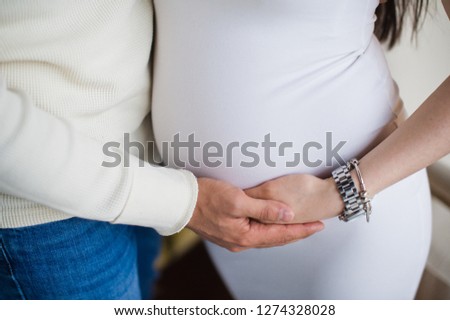 pregnant girl with her husband