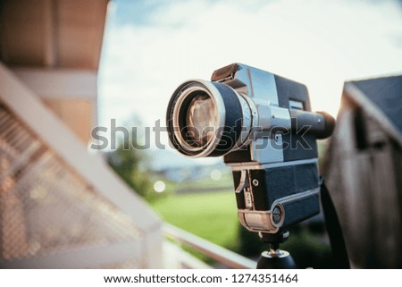 Vintage old movie camera, outdoor, sunset