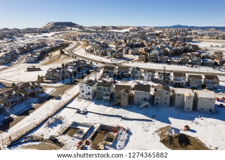 Photo illustrating the Colorado housing boom as it continues year round, including winter