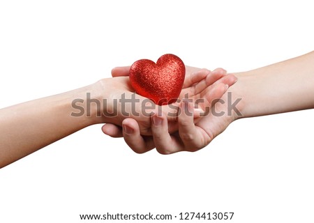 Male and female hands holding a red love heart, isolated on white background