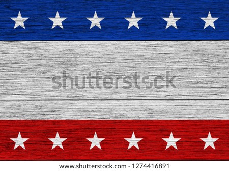 USA flag elements on wood background 
