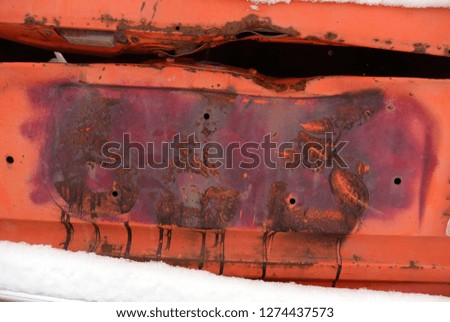 Winter 2018. Russia. Nizhny Novgorod Region. Sarov. Texture of Old Rusty Broken Red Retro Car.