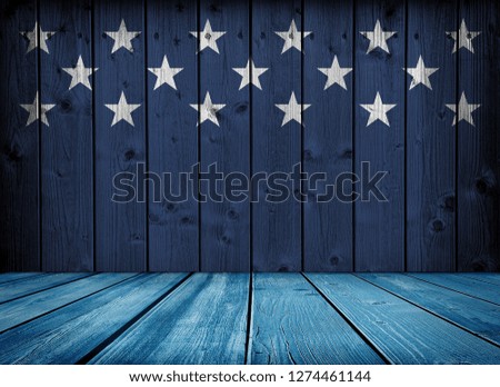 Wood wall and floor painted to replicate the American flag style. Empty interior room with american flag style.