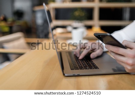 Close up man Hands using laptop. Online shopping