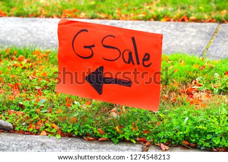 Garage Sale Sign on Grass
