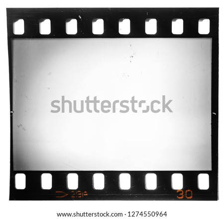 Old 35mm film strip or frame on white with drop shadow