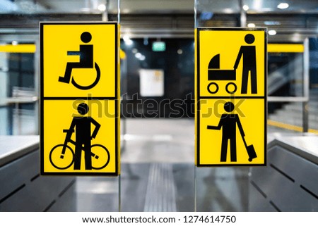 handicapped, bicycle, stroller and big luggage yellow pictrogram in metro, information in public transport, no people