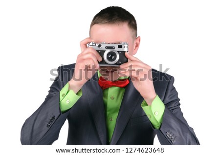 Photographer with retro style film photo camera isolated on a white background.
