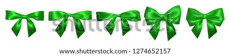 Realistic green bow isolated on white. Element for decoration gifts, greetings, holidays. Vector illustration.
