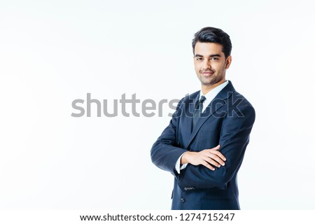 Portrait of a confident smiling businessman with arms crossed Royalty-Free Stock Photo #1274715247