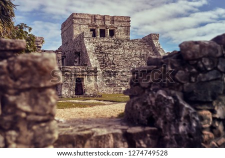 selective Temple of the frescos in the Mayan complex of Tulum, in Mexico taken during the sunset.  Royalty-Free Stock Photo #1274749528