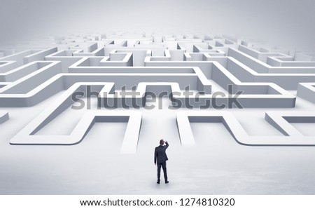 Businessman getting ready to enter a 3D flat labyrinth concept