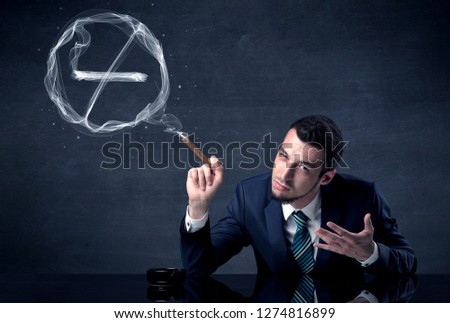 Businessman smoking cigarette and the smoke forms a no smoking sign.
