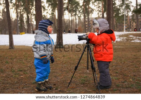 Little boys on a photo shoot in the winter park