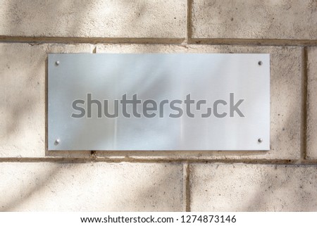 Mock up view of a plate metal sign 