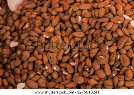 almond nuts background on market counter 