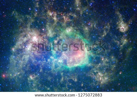 Awesome colorful nebula somewhere in endless universe. Elements of this image furnished by NASA