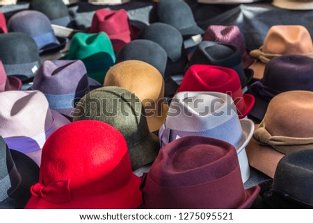 hats for sale in market stall