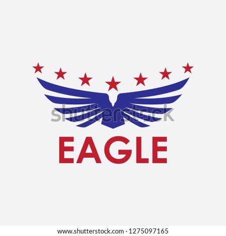Eagle icon with stars in US flag colors. Negative space.