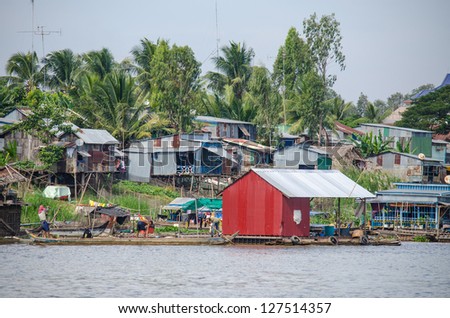 Mekong Delta, Cambodia - floating village at the riverside