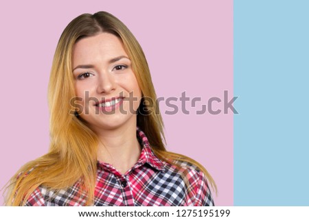 Portrait of happy smiling young beautiful woman