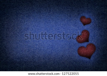 Jeans fabric with heart pattern use as background