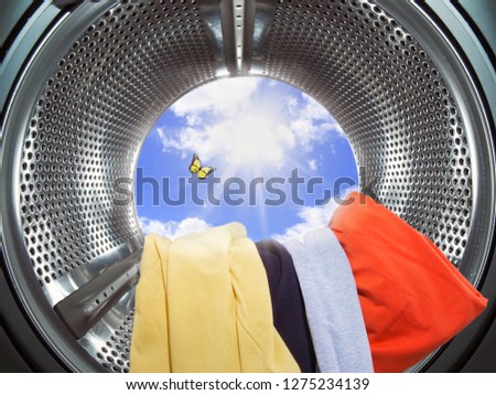 washing machine with clouds and butterfly