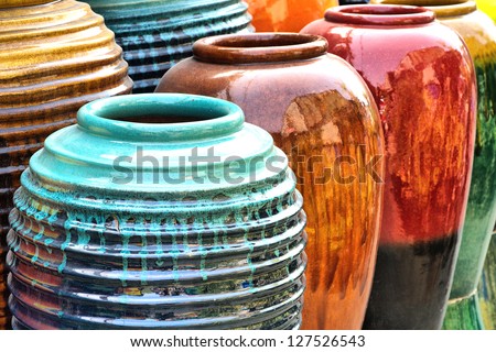 Colored jars. Royalty-Free Stock Photo #127526543