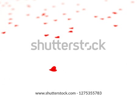 Small hearts on white background