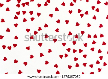 small hearts spreaded on white background