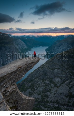 Norway's world famous Troll Tongue rock. Located near Bergen, Norway. Royalty-Free Stock Photo #1275388312