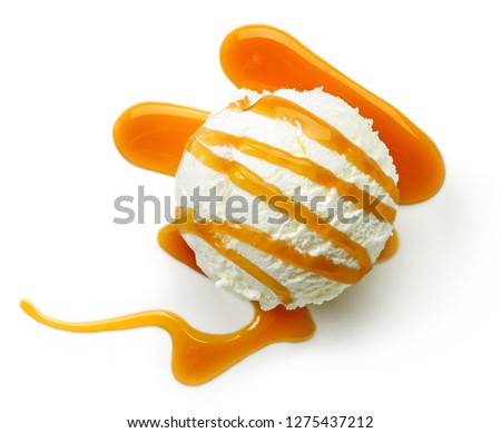 vanilla ice cream decorated with caramel sauce isolated on white background, top view