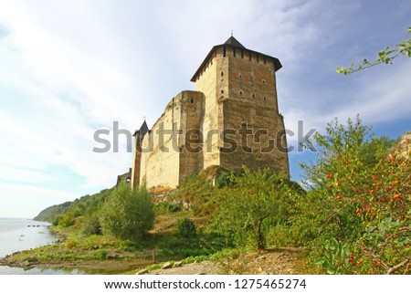 Mighty medieval fortress in town of Khotyn (Western Ukraine, Chernivtsi region) on bank of Dnister river, nowadays museum and popular travel destination. Huge high castle tower with sky on background
 Royalty-Free Stock Photo #1275465274