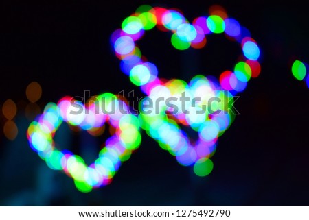 Different colors Bokeh. Abstract light for background. Holidays background with blurred bright Bokeh lights. Creative valentine's day concept. 