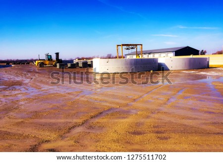 Concrete Precast Stockpile Background. Used in heavy highway construction as reinforcement layers in concrete structures. Three sided arches Construction Inspection Transportation DOT Approved  Royalty-Free Stock Photo #1275511702