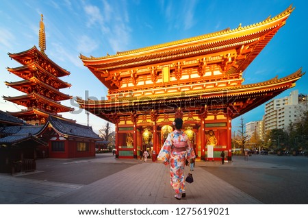 Japanese lady in Kimono dress walking in Sensoji Temple, Asakusa city, Tokyo, Japan. This image can use for travel in Tokyo and Japan concept