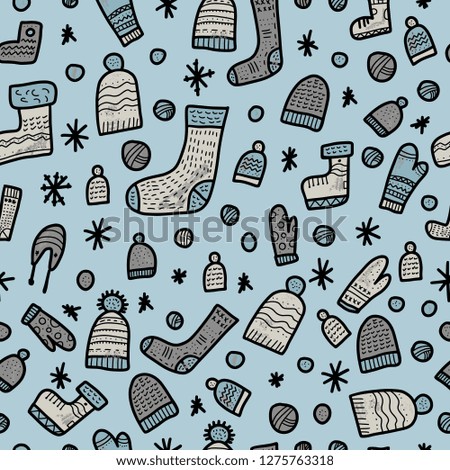 Seamless pattern of warm socks, beanies, gloves. Endless background. Vector illustration.